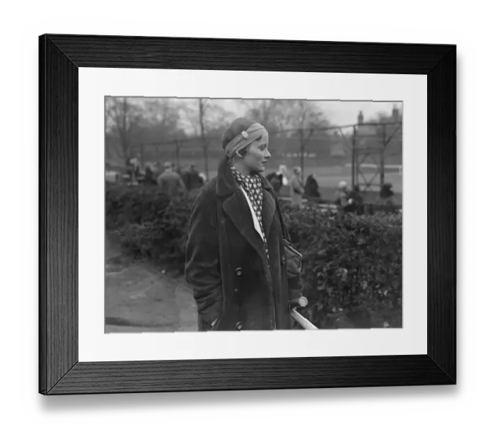 Framed Print : New fashion in tennis headwear. Miss J Mc Alpine plays with watch in bandou Framed Print : New fashion in tennis headwear. Miss J Mc Alpine plays with watch in bandou