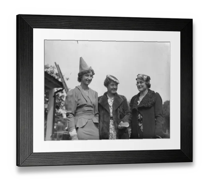 Framed Print : Contrasting hat fashions at free Wimbledon reception. Three of the original