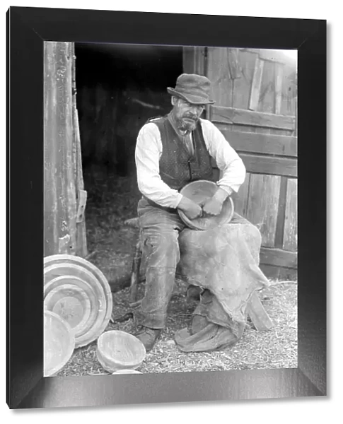 Mr George Lailey engaged in the ancient craft of wooden bowl making at Bucklebury, Berks