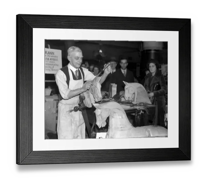 Framed Print : (74 Hillfield Avenue, N. 8) Mr Rann, for 50 years a maker of wooden horses, demonstrates Framed Print : (74 Hillfield Avenue, N. 8) Mr Rann, for 50 years a maker of wooden horses, demonstrates