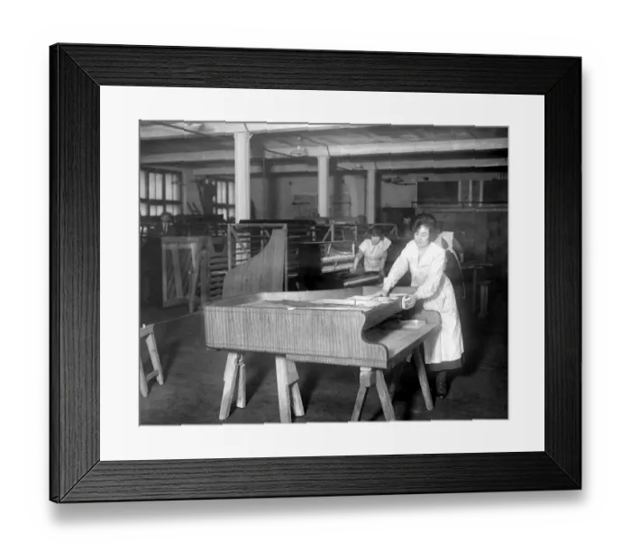 Framed Print : Piano Making at Brinsmeads Factory. Polishing a fine satinwood case. 10 December