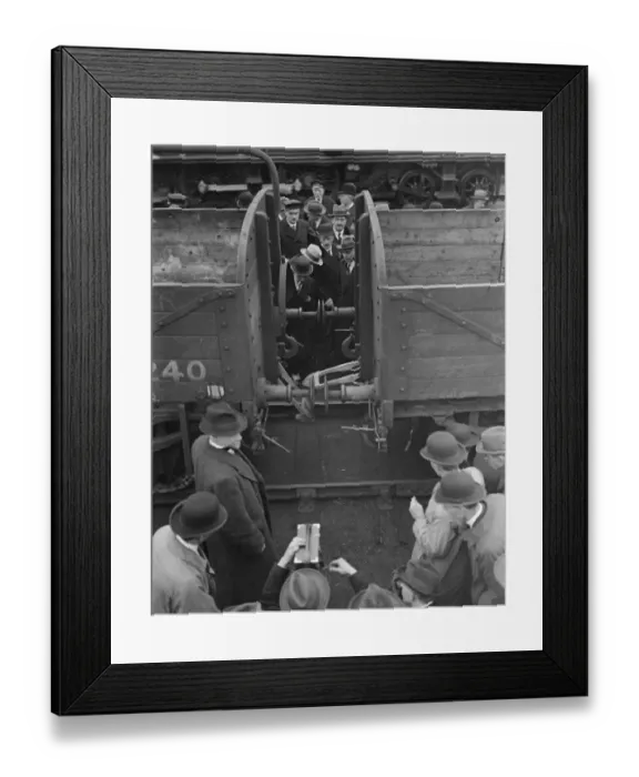 Framed Print : Coupling up railway carriages. New safety devices tested at Clapham Junt L ands W Rly