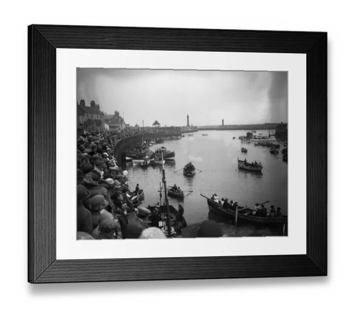 Framed Print : Crowds at Whitby harbour watching the rowing boats on the River Esk, Yorkshire Framed Print : Crowds at Whitby harbour watching the rowing boats on the River Esk, Yorkshire