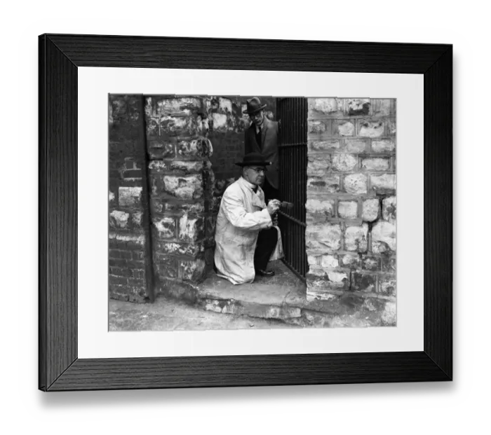 Framed Print : The Reverend T Walton, vicar of St Andrews Church, Lambeth, who is engaged