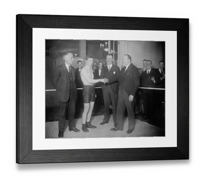 Framed Print : Roland Todd ( stripped ) shaking hands with the Manager of the Savoy Hotel. On Framed Print : Roland Todd ( stripped ) shaking hands with the Manager of the Savoy Hotel. On