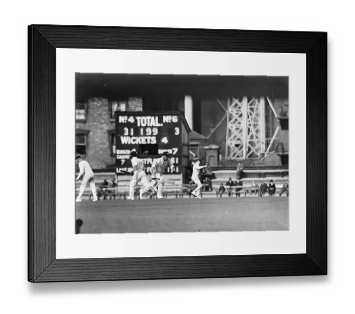 Framed Print : Warwickshire versus Surrey. Father and son at The Oval wicket. W G Quaife
