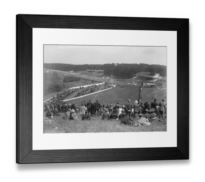 Framed Print : Goodwood races. A striking general view of the course, stands and enclosure during Framed Print : Goodwood races. A striking general view of the course, stands and enclosure during