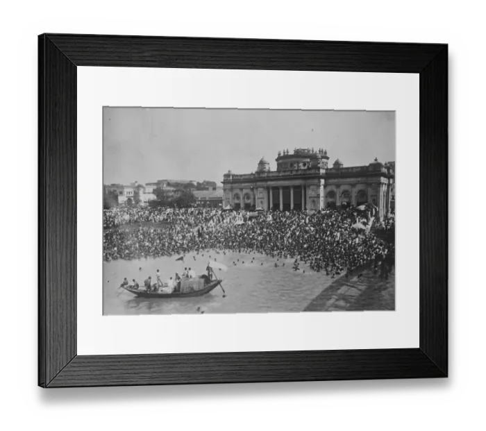 Framed Print : Holy Bathers A striking scene during the Hindu festival, Surjya Grahu on the occasion