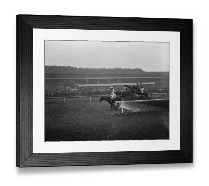 Framed Print : Sensational Grand National. Some of the field taking one of the difficult jumps