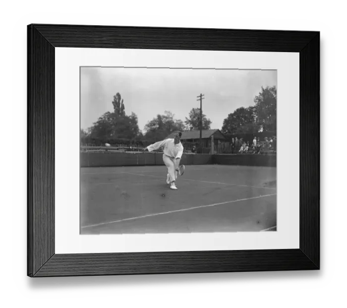 Framed Print : England versus Holland tennis match at Roehampton. J B Gilbert ( England ) in play Framed Print : England versus Holland tennis match at Roehampton. J B Gilbert ( England ) in play