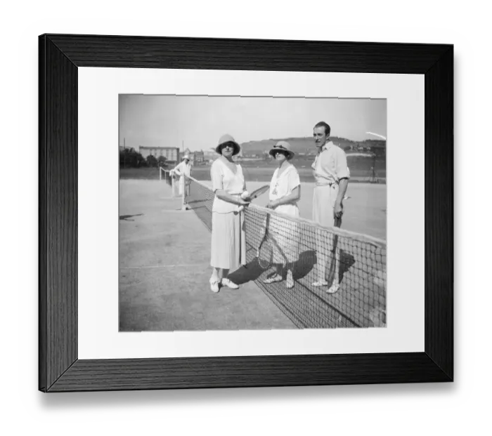 Framed Print : Pourville sur Mer attracts social stars. Miss Doris Joel chatting to Mr Guy Puckle Framed Print : Pourville sur Mer attracts social stars. Miss Doris Joel chatting to Mr Guy Puckle
