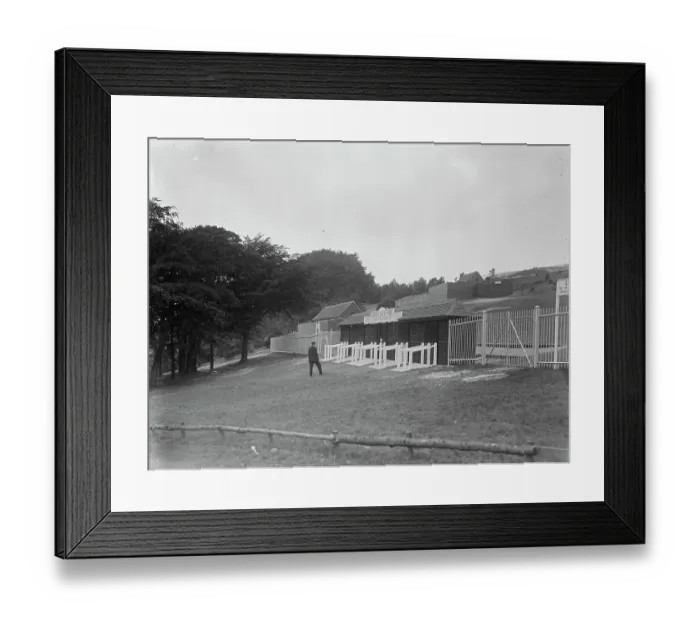 Framed Print : Goodwood racecourse. The gates at the entrance to Trundle Hill, which has now been enclosed