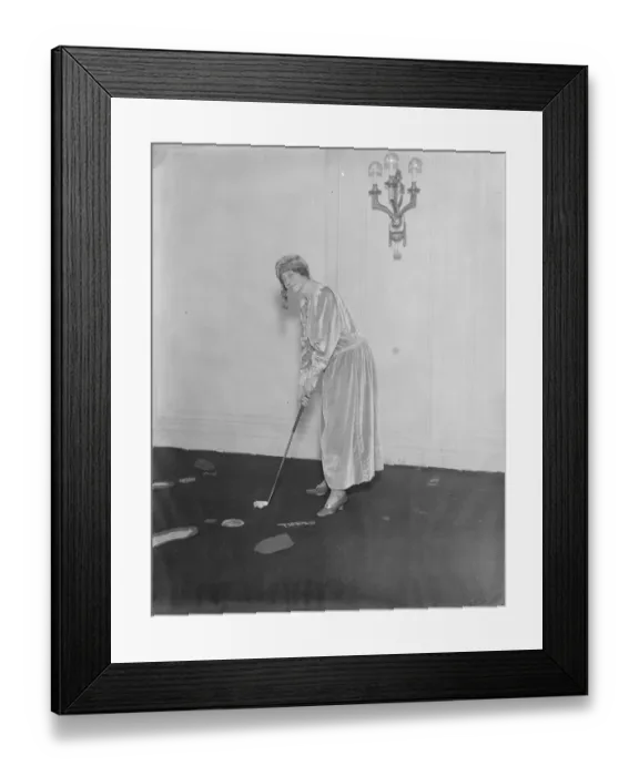 Framed Print : Hyde Park Hotel Christmas fair. The Duchess of Hamilton playing golf on the drawing Framed Print : Hyde Park Hotel Christmas fair. The Duchess of Hamilton playing golf on the drawing