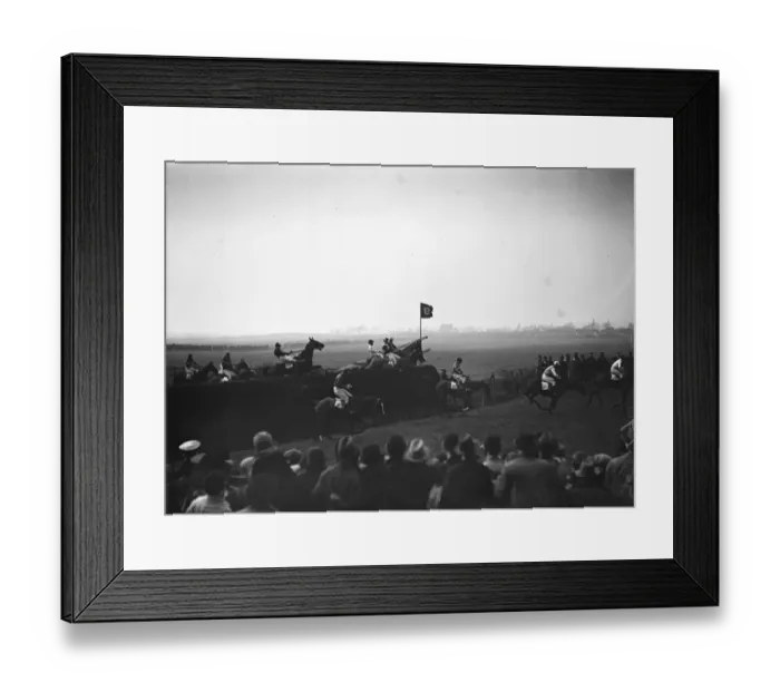Framed Print : Sensational Grand National. Some of the field taking the famous Bechers Brook Framed Print : Sensational Grand National. Some of the field taking the famous Bechers Brook