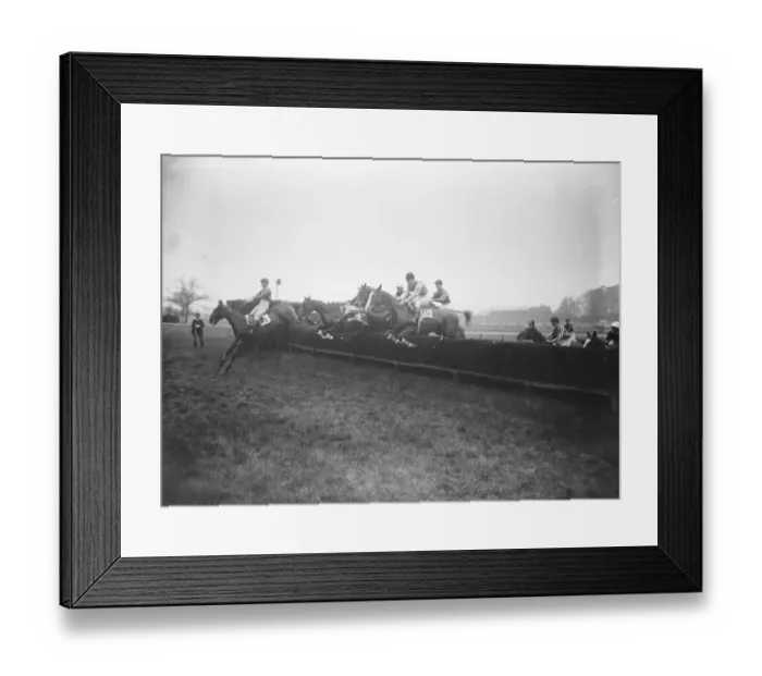 Framed Print : Grand military meeting at Sandown Park Some of the field taking one of the jumps Framed Print : Grand military meeting at Sandown Park Some of the field taking one of the jumps