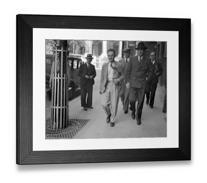 Framed Print : London Bus Strike Sequel. A. F. Papworth (tie flying) and Bill Ware arriving at transport