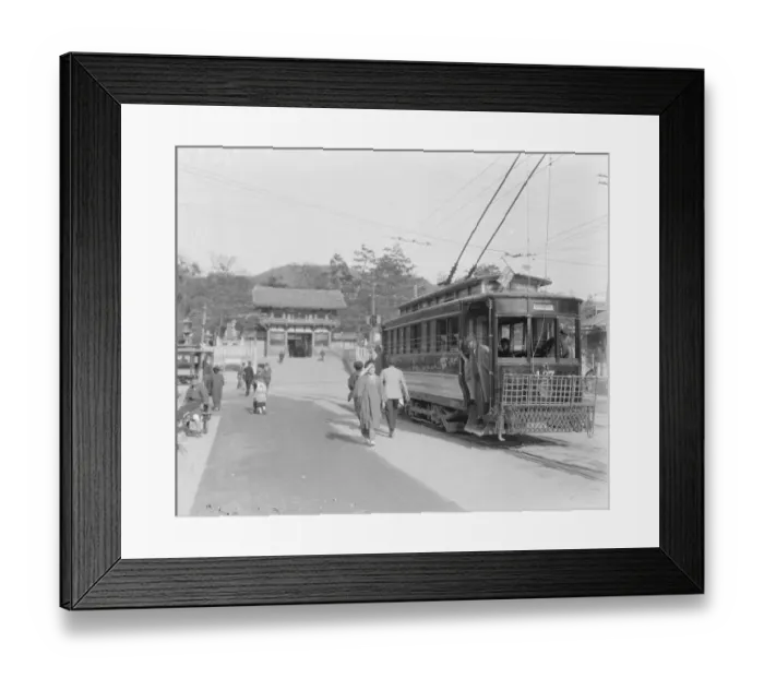 Framed Print : Kyoto island of Honshu, Japan An electric tram in the foreground, with an old gateway Framed Print : Kyoto island of Honshu, Japan An electric tram in the foreground, with an old gateway