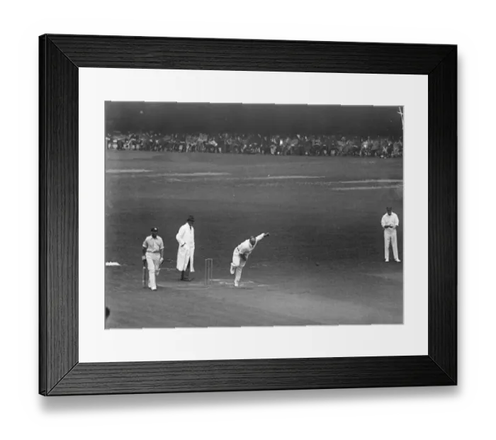Framed Print : Surrey versus Lancashire at The Oval cricket ground. Cook bowling. 26 July 1922