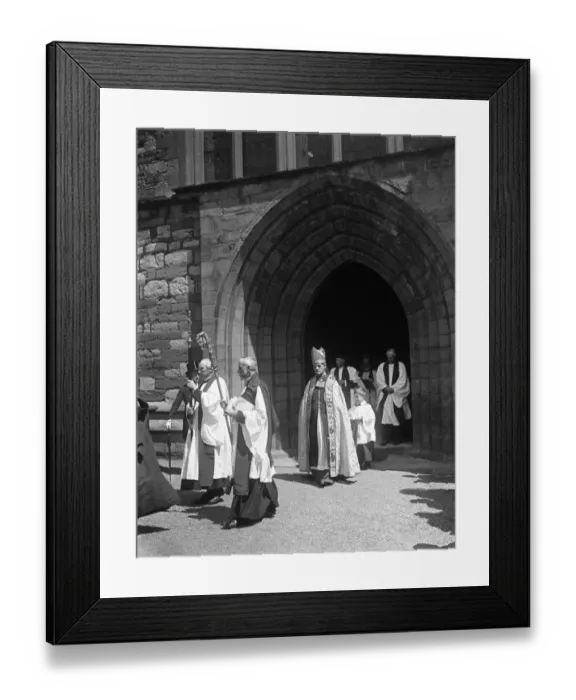 Framed Print : At St Asaph, Wales. Dr Edwards, first Archbishop of Wales leaving the cathedral Framed Print : At St Asaph, Wales. Dr Edwards, first Archbishop of Wales leaving the cathedral