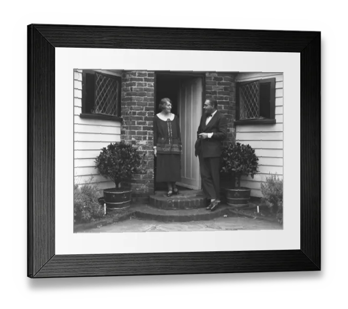 Framed Print : British film stars, Mr Henry Edwards and Miss Chrissie White at their front door Framed Print : British film stars, Mr Henry Edwards and Miss Chrissie White at their front door