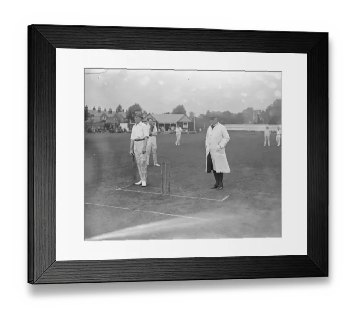 Framed Print : Slough Police versus Clergy Cricket Match The Bishop of Buckingham umpiring, batsmen Framed Print : Slough Police versus Clergy Cricket Match The Bishop of Buckingham umpiring, batsmen