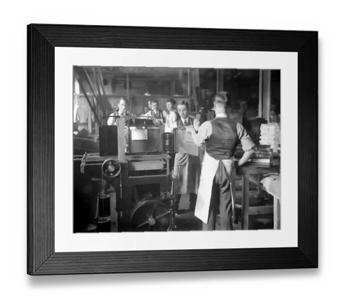 Framed Print : At Messrs James Burns Book Binding works at Esher. Casing in by hand. 15 May 1923