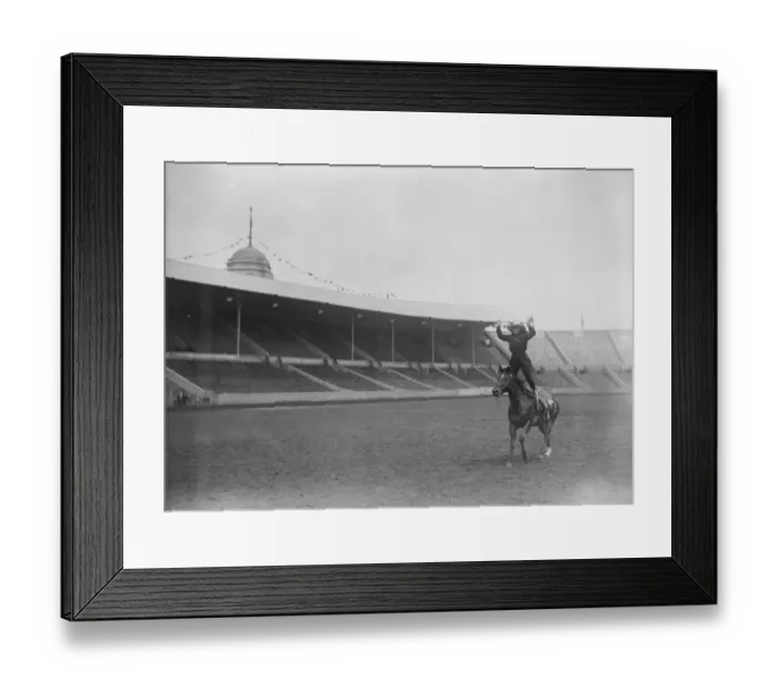 Framed Print : International rodeo starts at Wembley. A cowgirl gives an exhibition of trick riding Framed Print : International rodeo starts at Wembley. A cowgirl gives an exhibition of trick riding