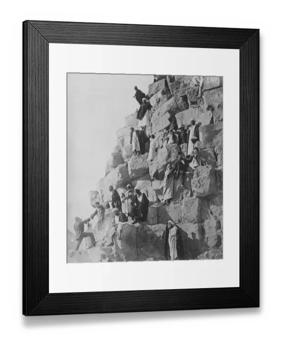 Framed Print : Yhe great pyramid of Cheops, Egypt. The great pyramid of Cheops, on which a tourist Framed Print : Yhe great pyramid of Cheops, Egypt. The great pyramid of Cheops, on which a tourist