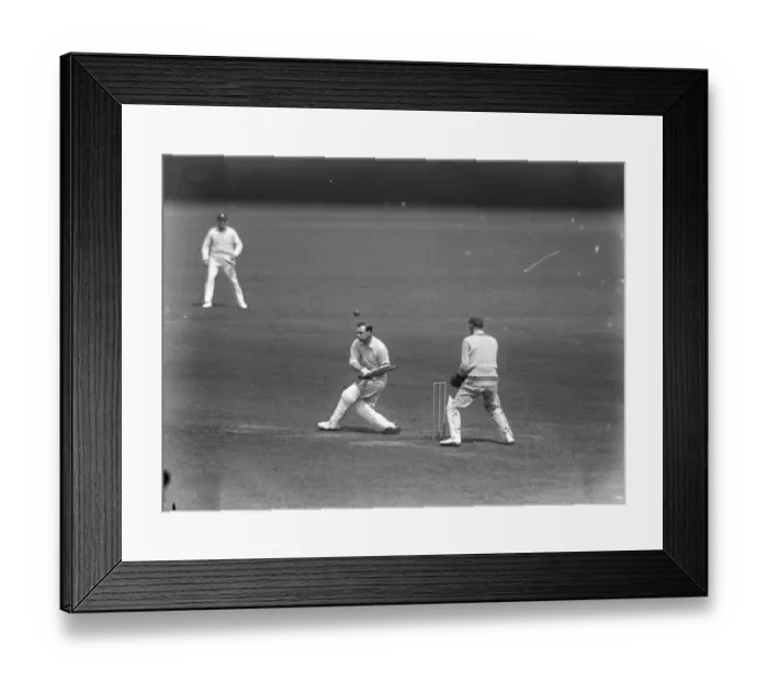 Framed Print : Surrey versus Hampshire at the Oval. Peach ( Surrey ) lifts a ball from Kennedy Framed Print : Surrey versus Hampshire at the Oval. Peach ( Surrey ) lifts a ball from Kennedy
