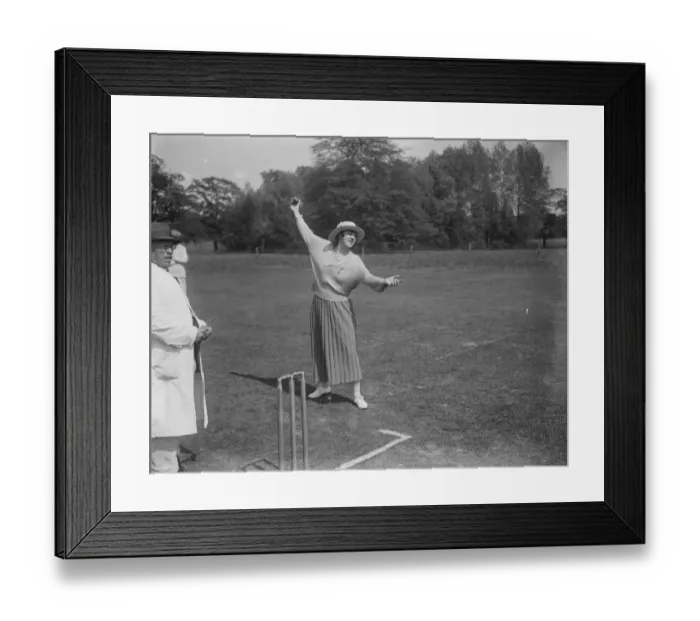 Framed Print : Miss Violet Loraine bowls the first ball at the opening match of the Langley Park