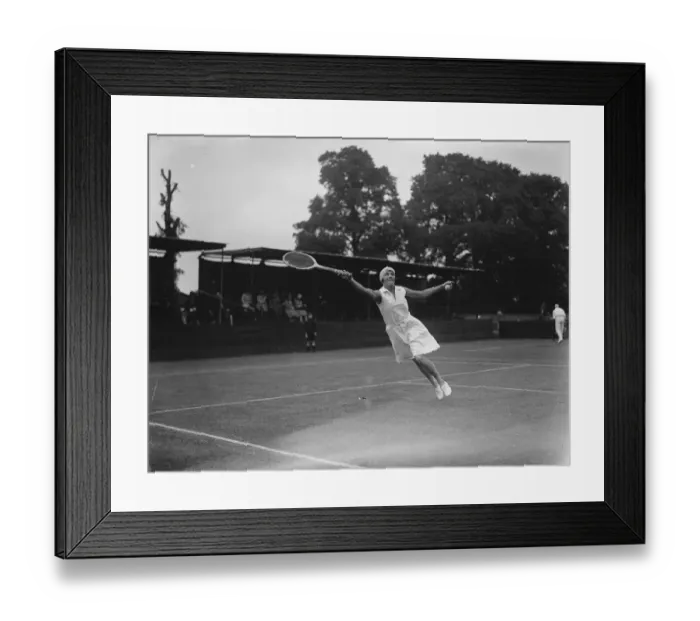 Framed Print : Surrey tennis championship at Surbiton. Miss Tapscott ( South Africa ) makes a leap for the ball Framed Print : Surrey tennis championship at Surbiton. Miss Tapscott ( South Africa ) makes a leap for the ball