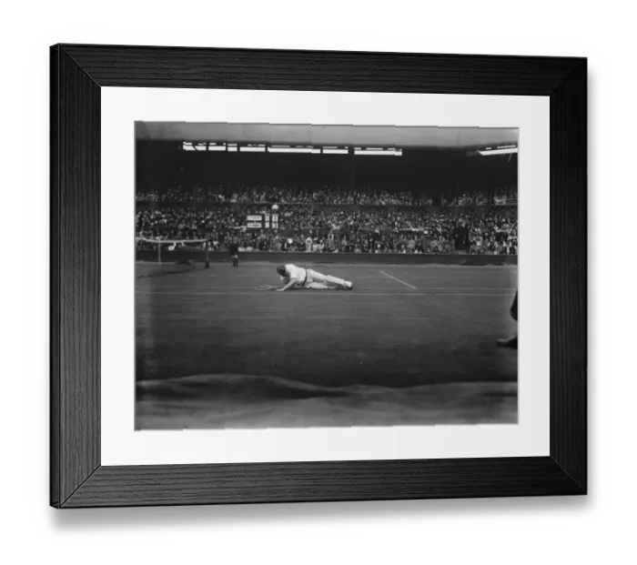 Framed Print : Vincent Richards defeated by Cochet at Wimbledon. Richards falls in returning a