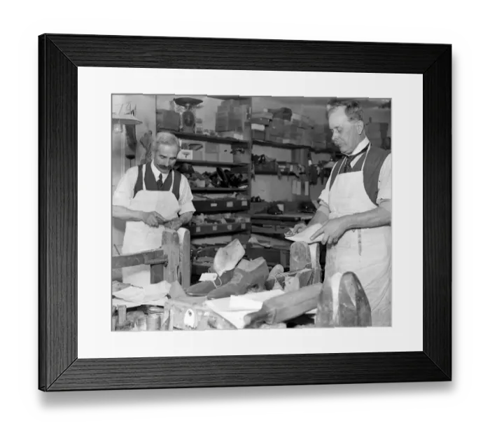 Framed Print : Making of wooden shoe lasts ( W. H. Smith, Sloane Street ). Smoothing after shaping the last