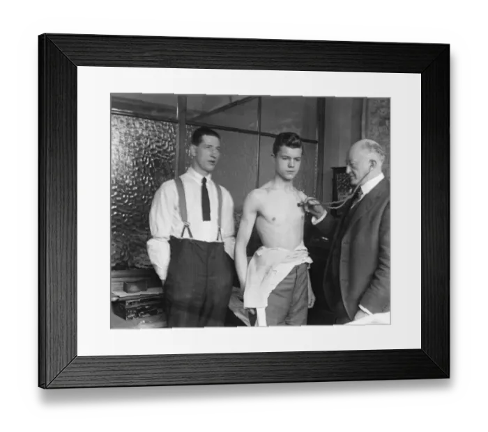 Framed Print : Would be emigrants for South Australia. Dr E W Morris medically inspects applicants Framed Print : Would be emigrants for South Australia. Dr E W Morris medically inspects applicants