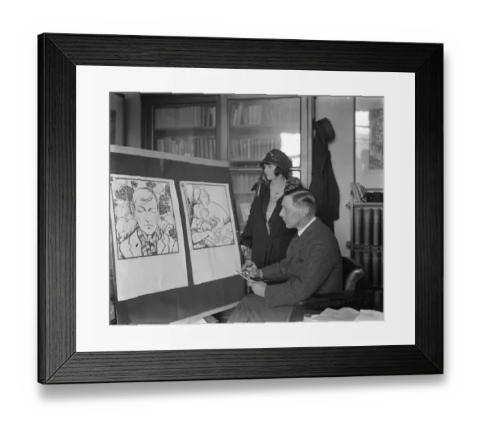 Framed Print : Mr G E Studdy and Mrs Studdy inspect winning poster for geranum day Mr G E Studdy