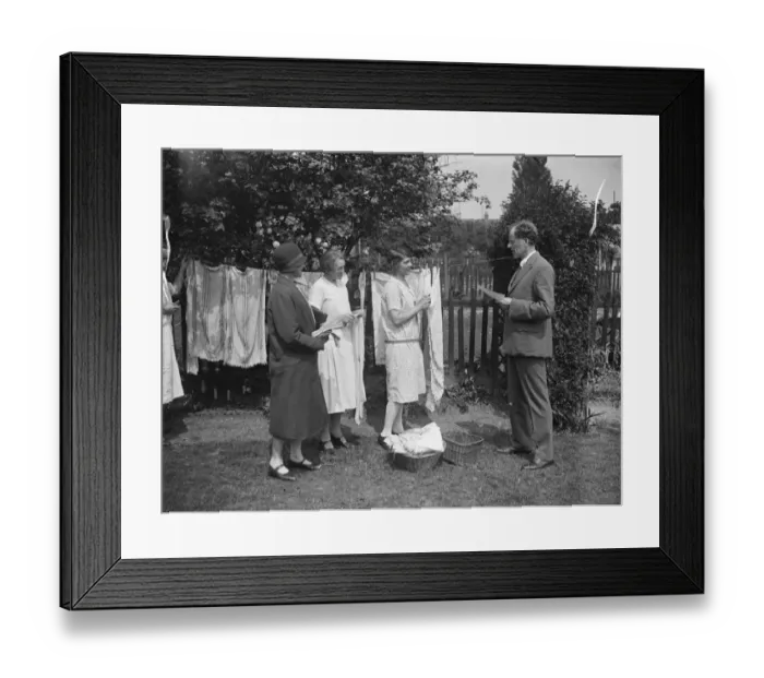 Framed Print : Canvassing on washing day. Mr Comyns Carr, KC, the Liberal candidate seeks Framed Print : Canvassing on washing day. Mr Comyns Carr, KC, the Liberal candidate seeks