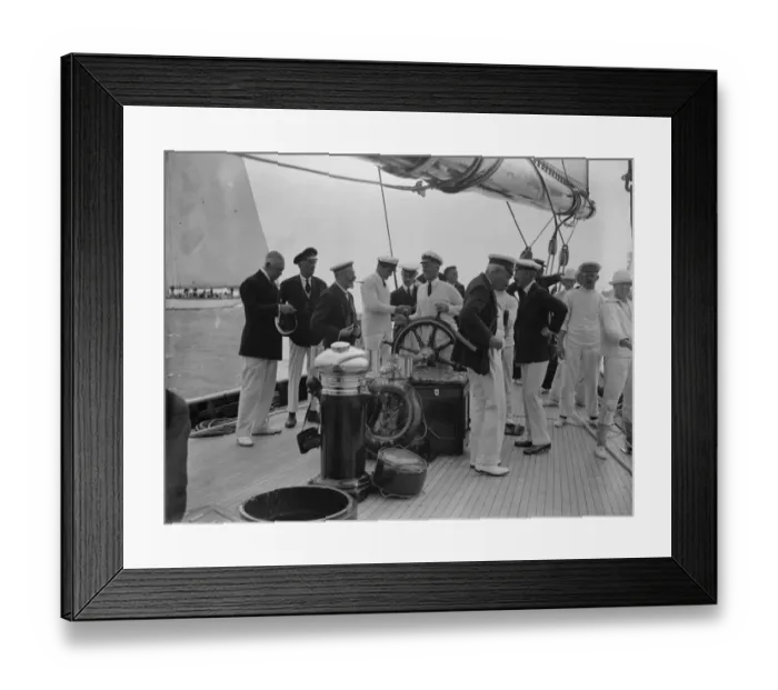 Framed Print : The King takes the wheel of his yacht Britannia. 7 August 1924 Framed Print : The King takes the wheel of his yacht Britannia. 7 August 1924