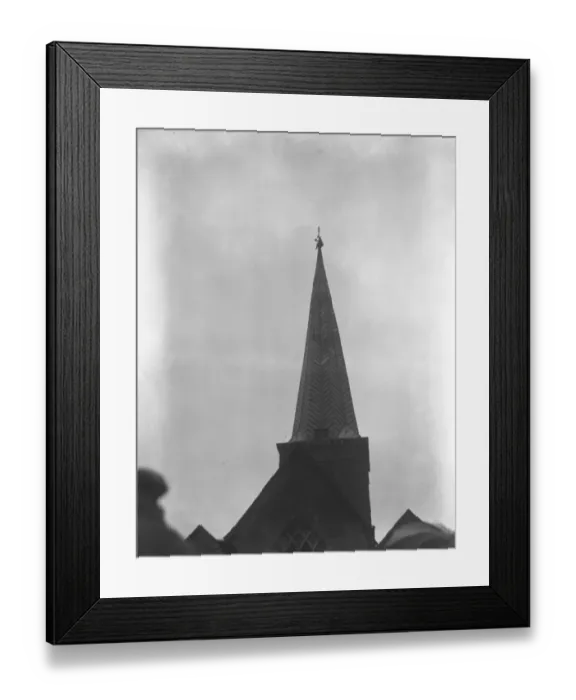 Framed Print : Mr Ager, the steeplejack, on top of the spire of Godalming church, retrieves a