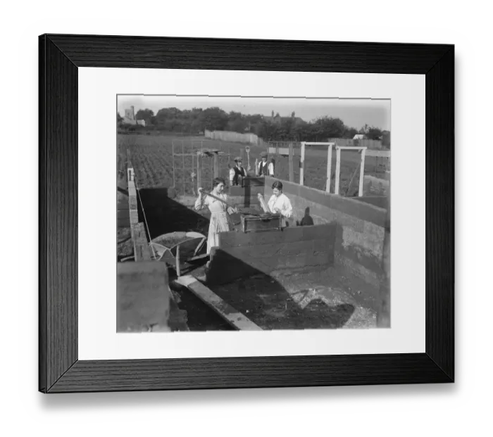 Framed Print : Concrete Houses at Harlow, Essex Girls filling the mould, in the background are Framed Print : Concrete Houses at Harlow, Essex Girls filling the mould, in the background are