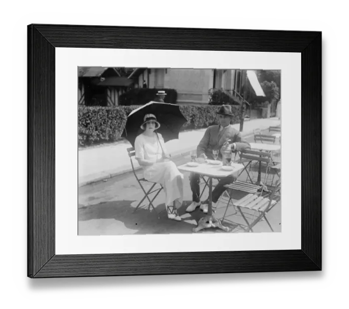 Framed Print : Society at Deauville. Captain and Mrs Maurice Kingscote outside the Potiniere Framed Print : Society at Deauville. Captain and Mrs Maurice Kingscote outside the Potiniere