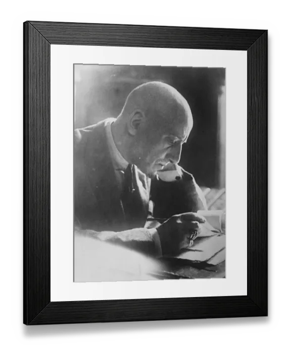 Framed Print : Gabriele D Annunzio at his desk in his villa at Gardone O N Garda 10 August 1922 Framed Print : Gabriele D Annunzio at his desk in his villa at Gardone O N Garda 10 August 1922
