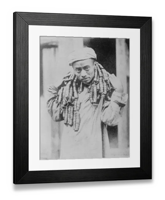 Framed Print : How a Chinese carries his coppers A Chinamans novel method of carrying 30 fen in cash
