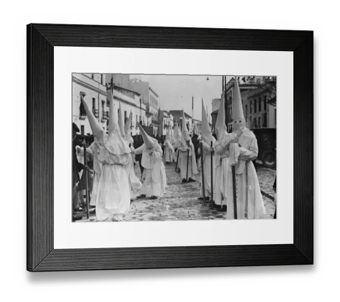 Framed Print : Holy week in Seville. One of the brotherhoods with the Nazarenes. 22 March 1929 Framed Print : Holy week in Seville. One of the brotherhoods with the Nazarenes. 22 March 1929