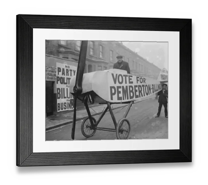 Framed Print : Mile End Election, Voter being taken to the booth in an aeroplane - Noel Pemberton Framed Print : Mile End Election, Voter being taken to the booth in an aeroplane - Noel Pemberton