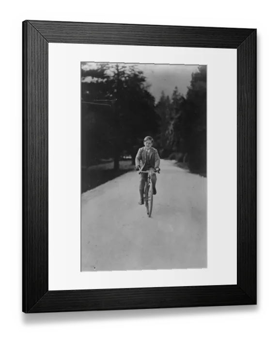 Framed Print : A cycling King. King Michael of Romania cycling in the grounds of his Palace at Sinaia Framed Print : A cycling King. King Michael of Romania cycling in the grounds of his Palace at Sinaia