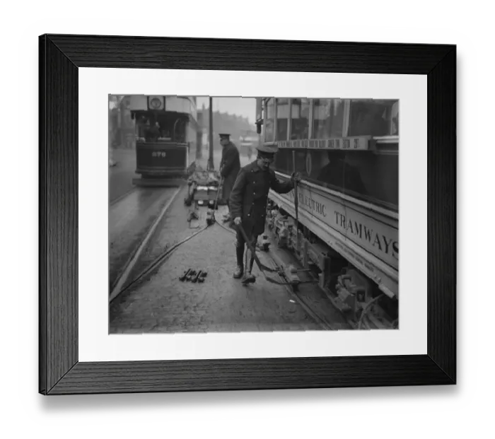 Framed Print : At places where the electric tram system changes from overhead cables to underground cables Framed Print : At places where the electric tram system changes from overhead cables to underground cables