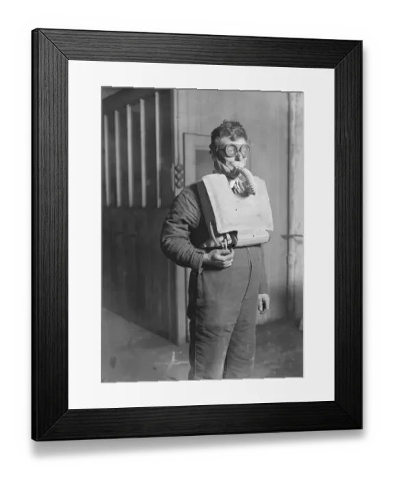 Framed Print : Mr R H Davis, managing director of Siebe, Gohman and Co, with the new apparatus Framed Print : Mr R H Davis, managing director of Siebe, Gohman and Co, with the new apparatus