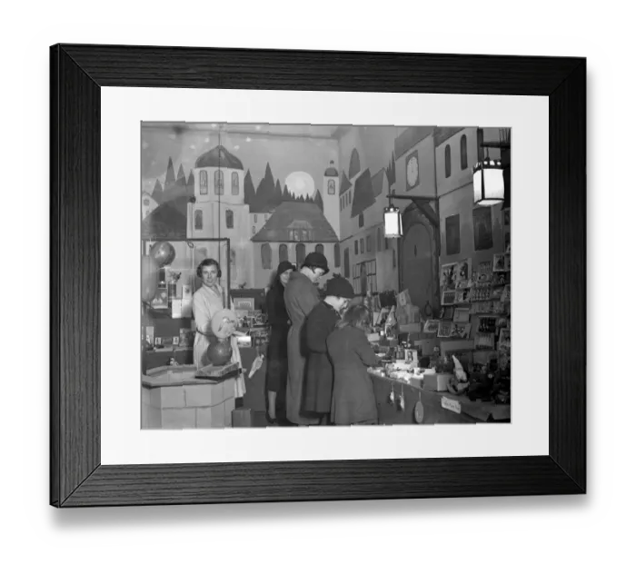 Framed Print : Lady Verney (striped scarf) in the toy and bookshop she has opened in the garage Framed Print : Lady Verney (striped scarf) in the toy and bookshop she has opened in the garage