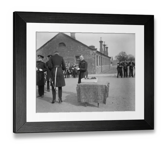 Framed Print : St Patricks Day with the Irish Guards. Col McCalmont decorating his hat after
