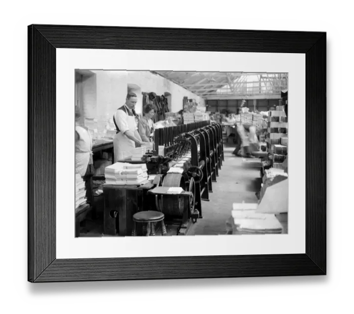 Framed Print : At Messrs James Burns Book Binding works at Esher. An ingenious machine whci collects
